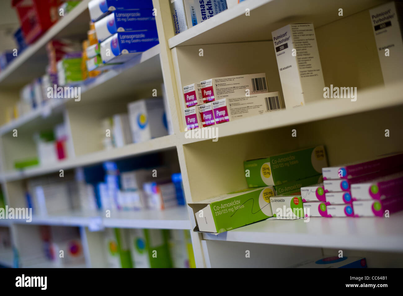 dispensary chemist display shelves of drugs Stock Photo