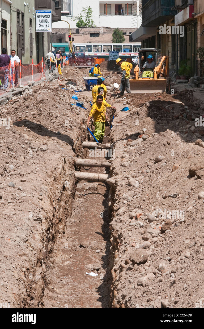 Peru, Lima. Construction workers in downtown Lima. Stock Photo