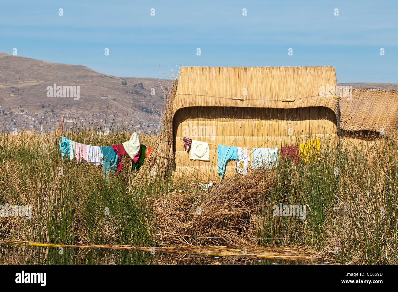 Peru, Lake Titicaca. Quechua or Uros Indian village on the floating Uros Islands. Stock Photo