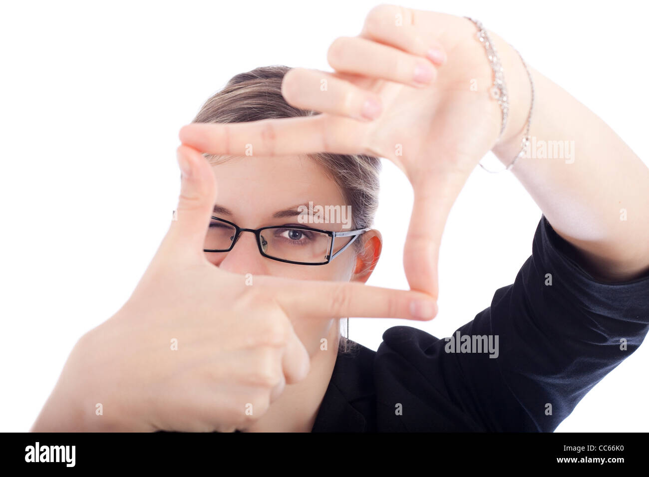 New business vision concept, businesswoman framing her face, isolated on white background. Stock Photo