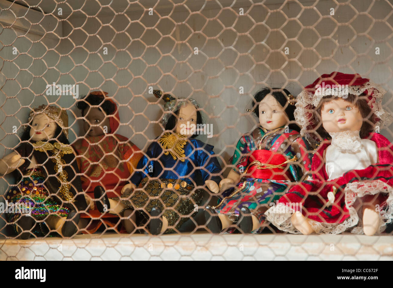 Vintage somewhat scary puppet toys at an antique shop, Spain Stock