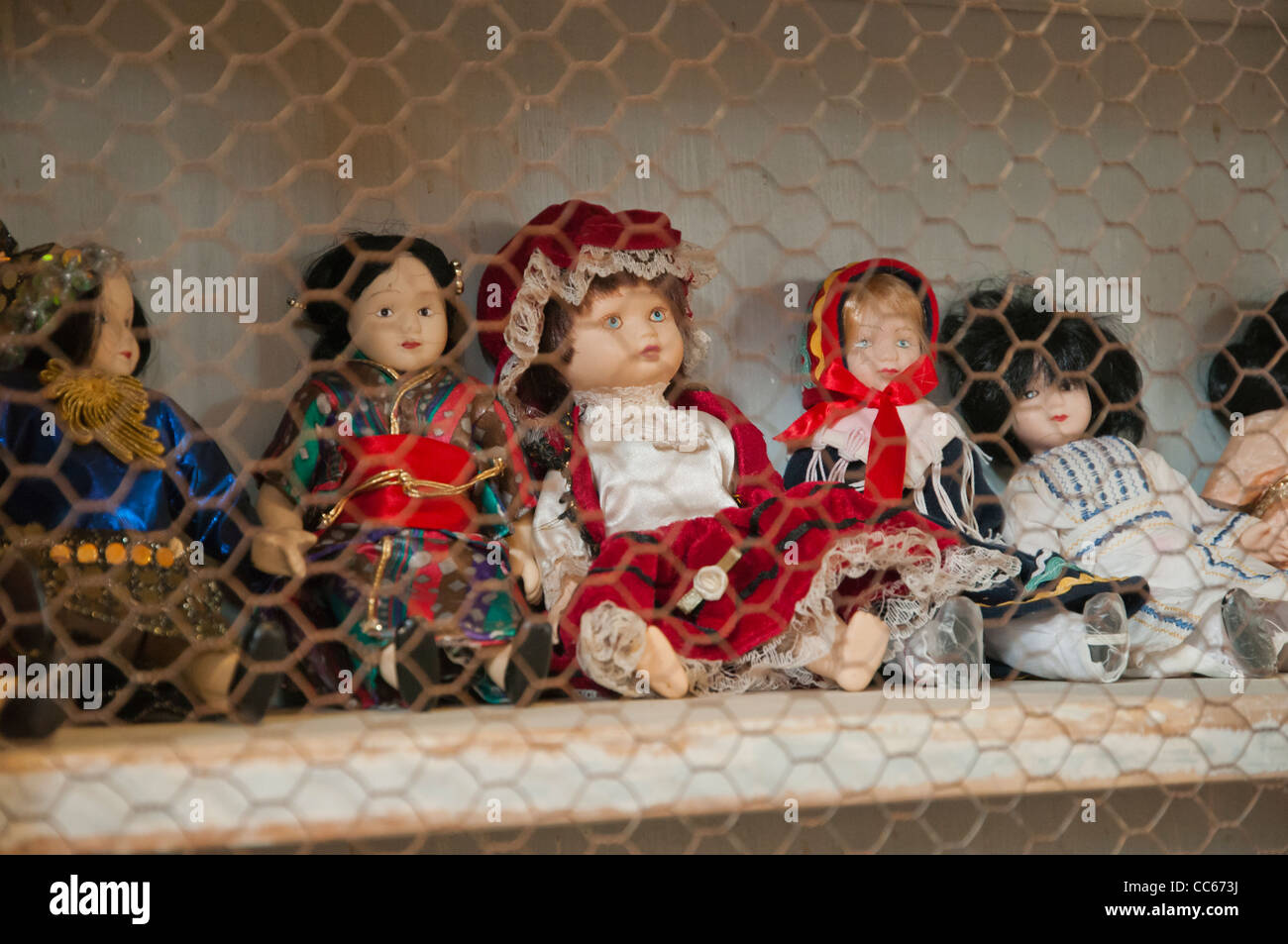 Vintage somewhat scary puppet toys at an antique shop, Spain Stock