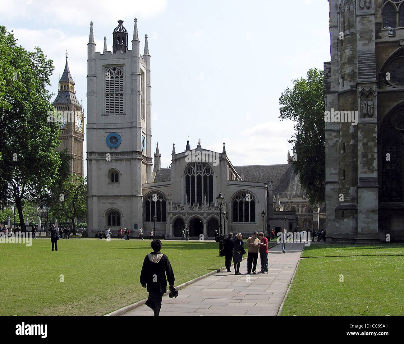 St. Margaret’s Church, Westminster, London, England. To the left is the Clock Tower of Big Ben, to the right is a corner of West Stock Photo