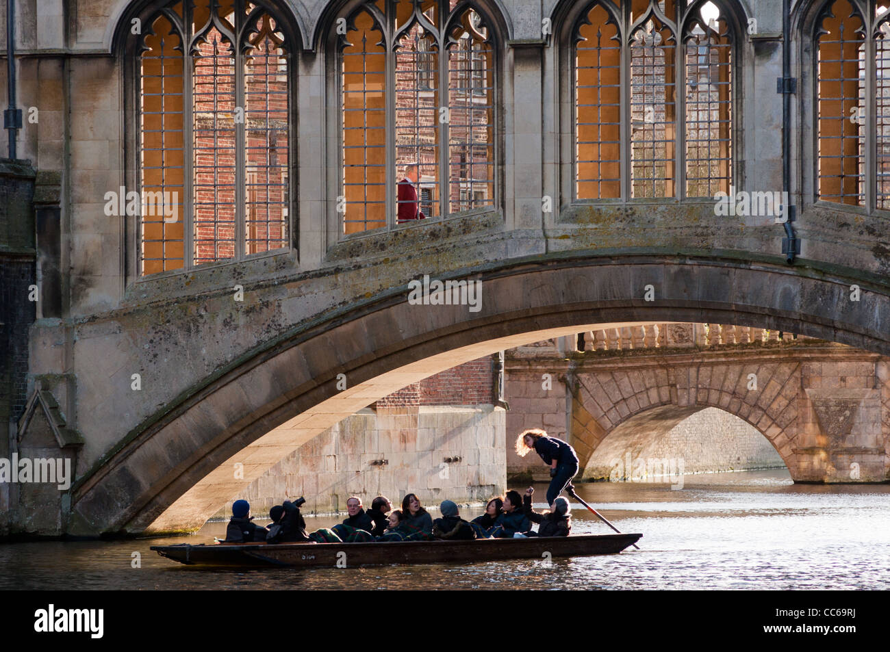 Punting under the Bridge of Sighs at St Johns College, Cambridge University, England. Stock Photo
