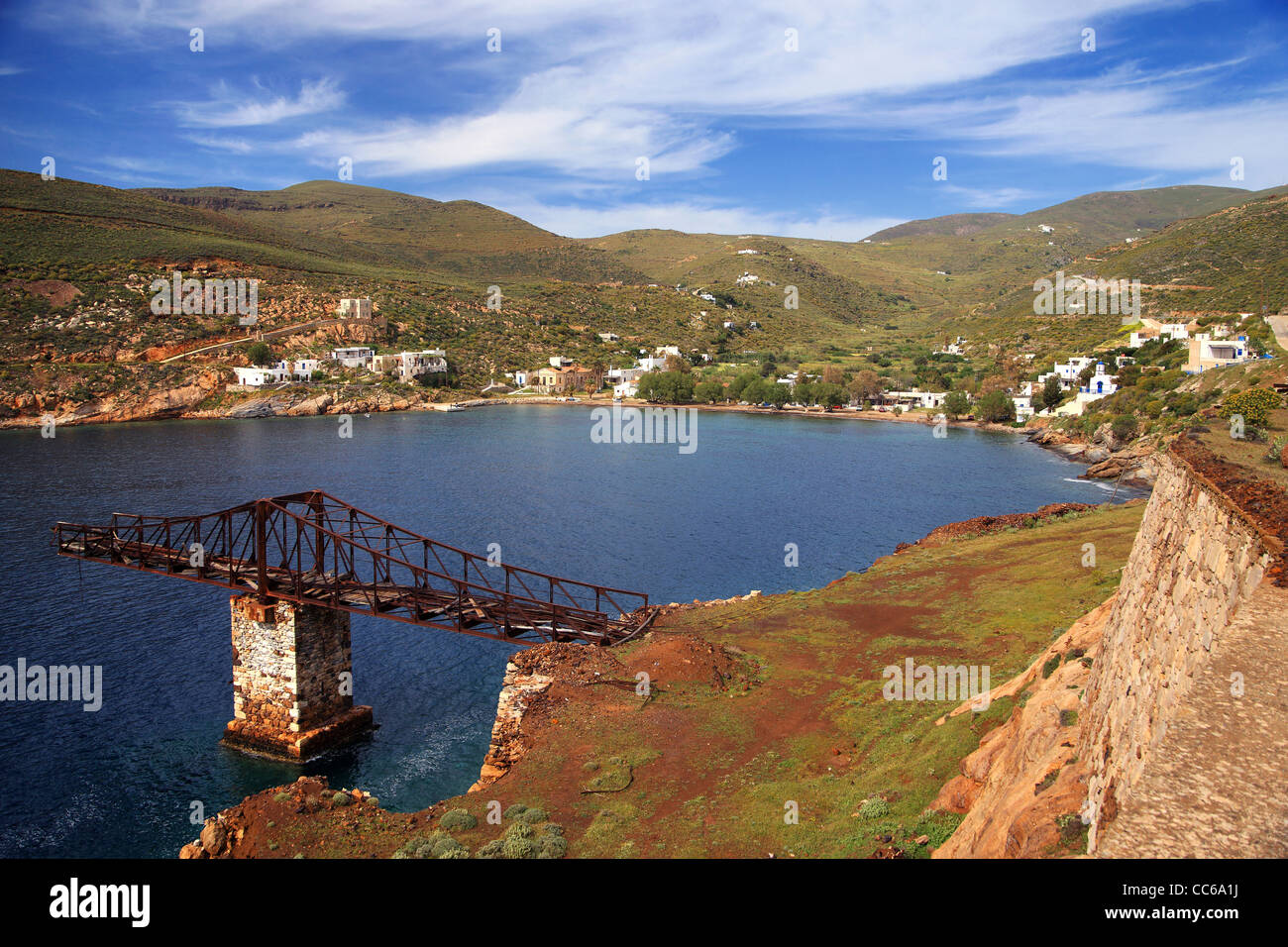 Greece, Serifos island, Mega Livadi village. An old, abandoned 'brigde' or 'ladder' used for loading minerals to ships. Stock Photo