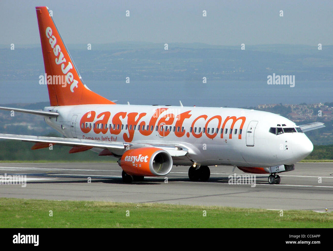 Boeing 737-700 of UK low cost carrier easyJet waiting for take off at Bristol International Airport, England. Stock Photo