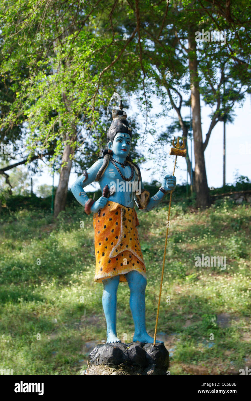 Hindu God Shiva Statue in the Beautiful green garden.Water(concept ...