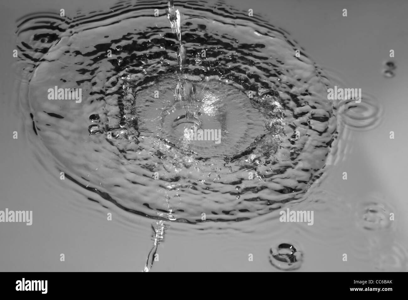 Water drop impact Black and White Stock Photos & Images - Alamy
