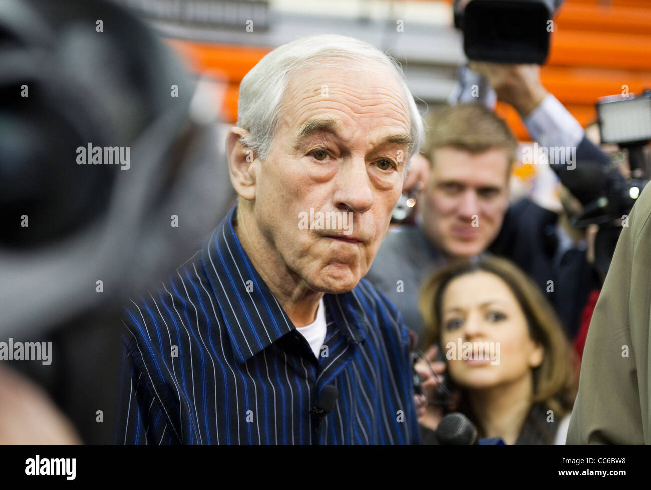 Republican presidential candidate Ron Paul waits to speak at a high school in West Des Moines, Iowa for the Iowa Caucuses Stock Photo