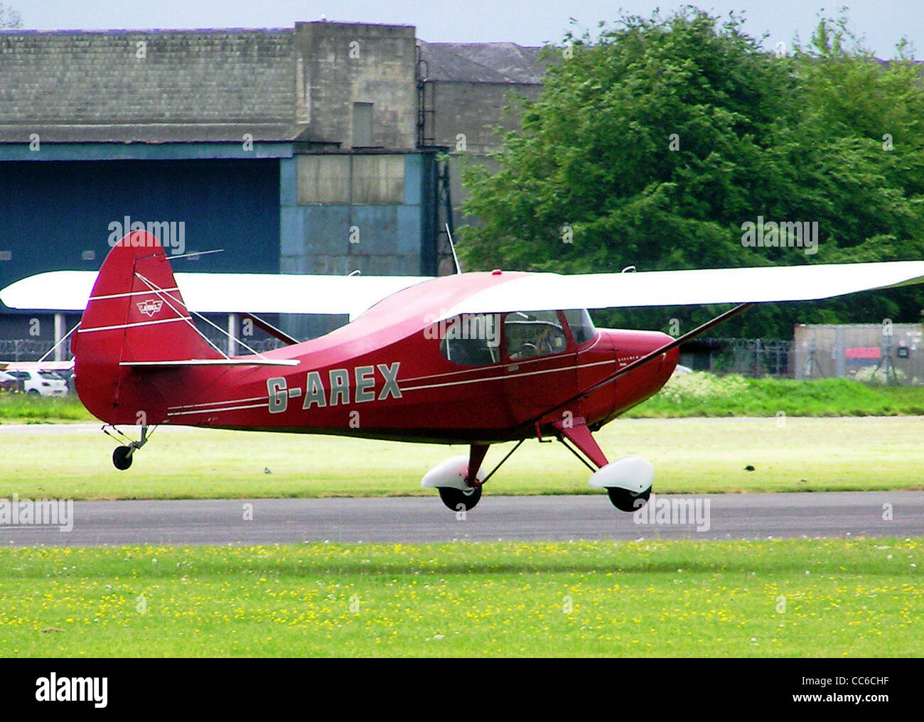 1948 Aeronca 15AC Sedan (G-AREX) landing at Hullavington Airfield, Wiltshire, England. Stock Photo