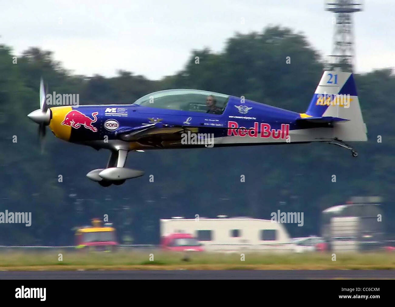 Hungarian aerobatics pilot Peter Besenyei racing his Extra 300 (HA-PET) at  a Red Bull Air Race in England Stock Photo - Alamy