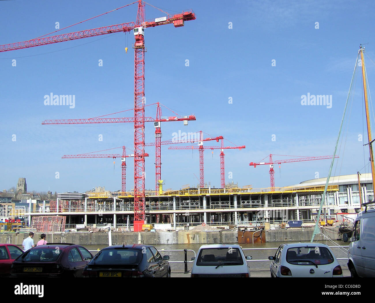 Six tower cranes constructing housing in the old docks, Bristol, England. Stock Photo