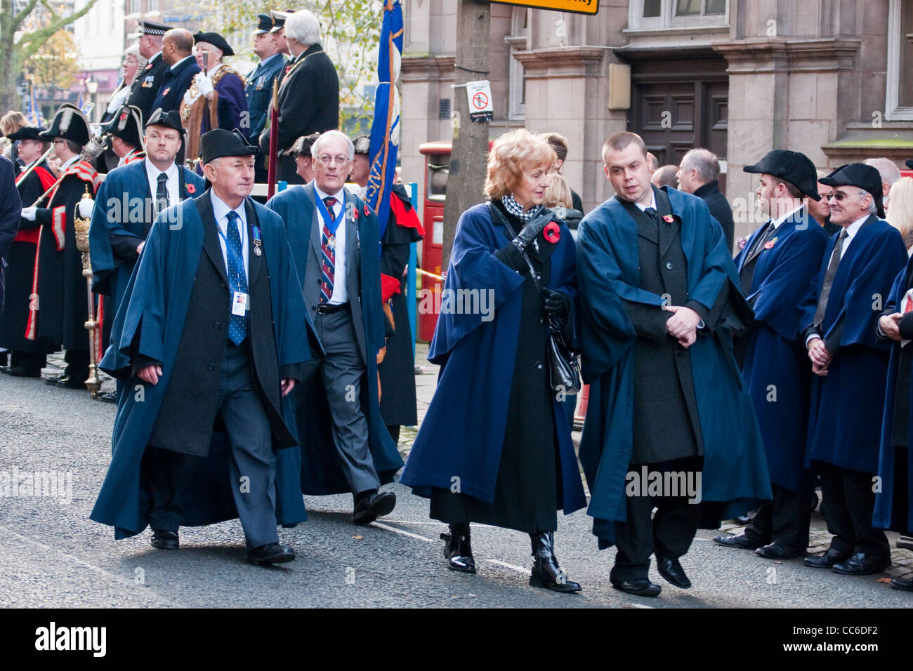 Preston City Council members walk in procession past the saluting dais