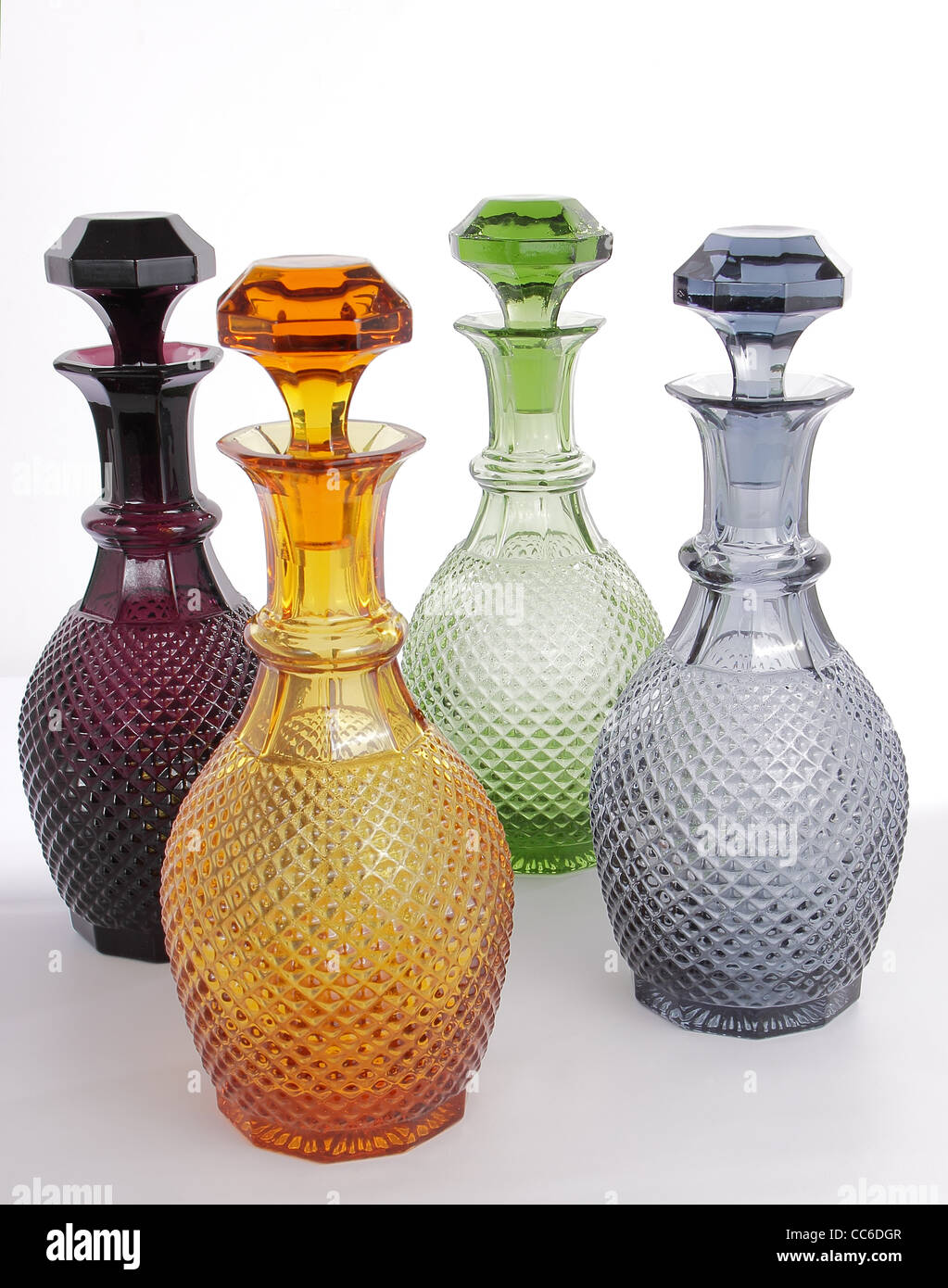 Handmade colored glass decanters Stock Photo