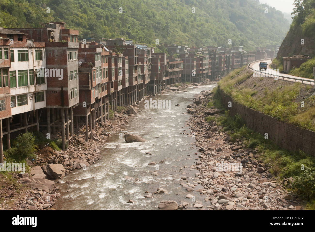 Stilt house along the stream, Yanjin, Zhaotong, Yunnan , China Stock
