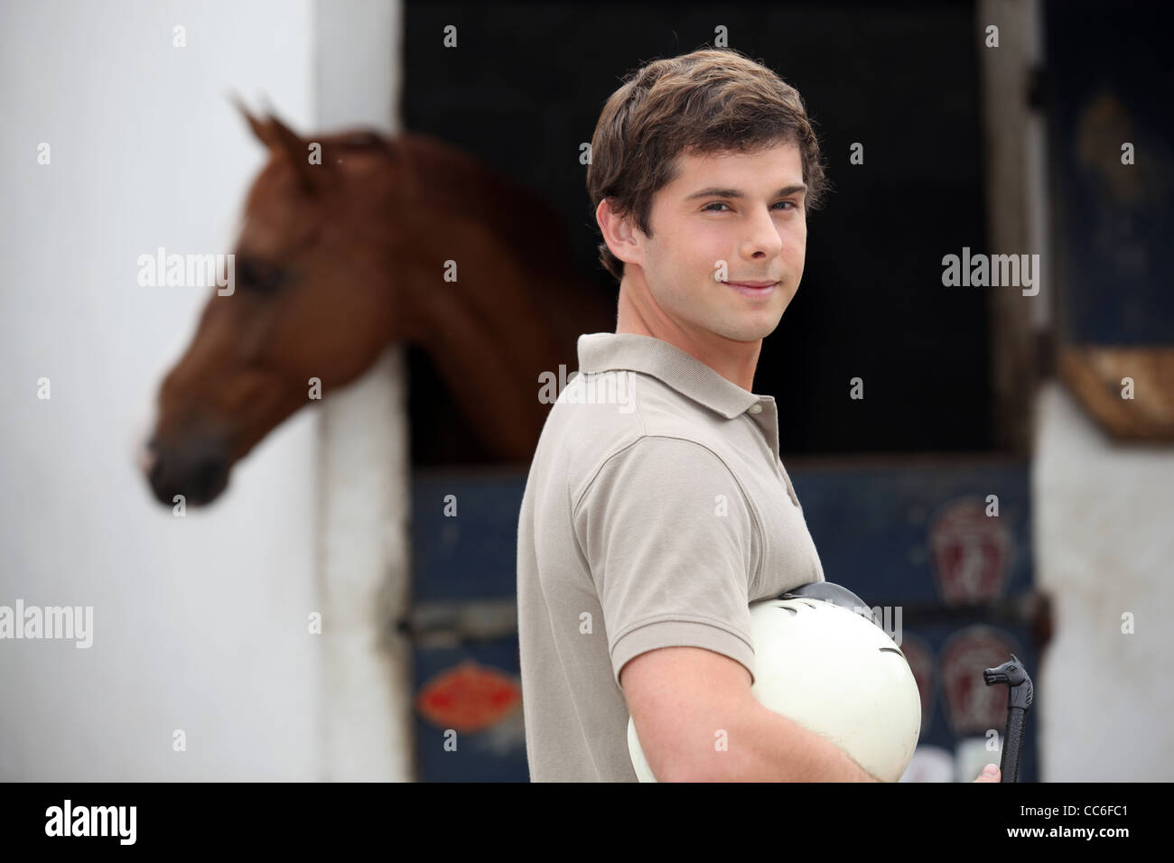 Man at the stables Stock Photo - Alamy