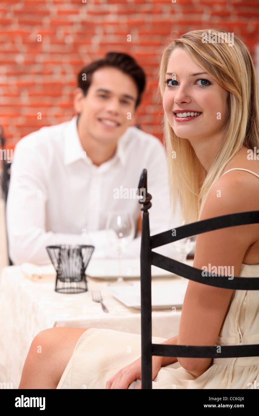 man and woman dining at a restaurant Stock Photo - Alamy