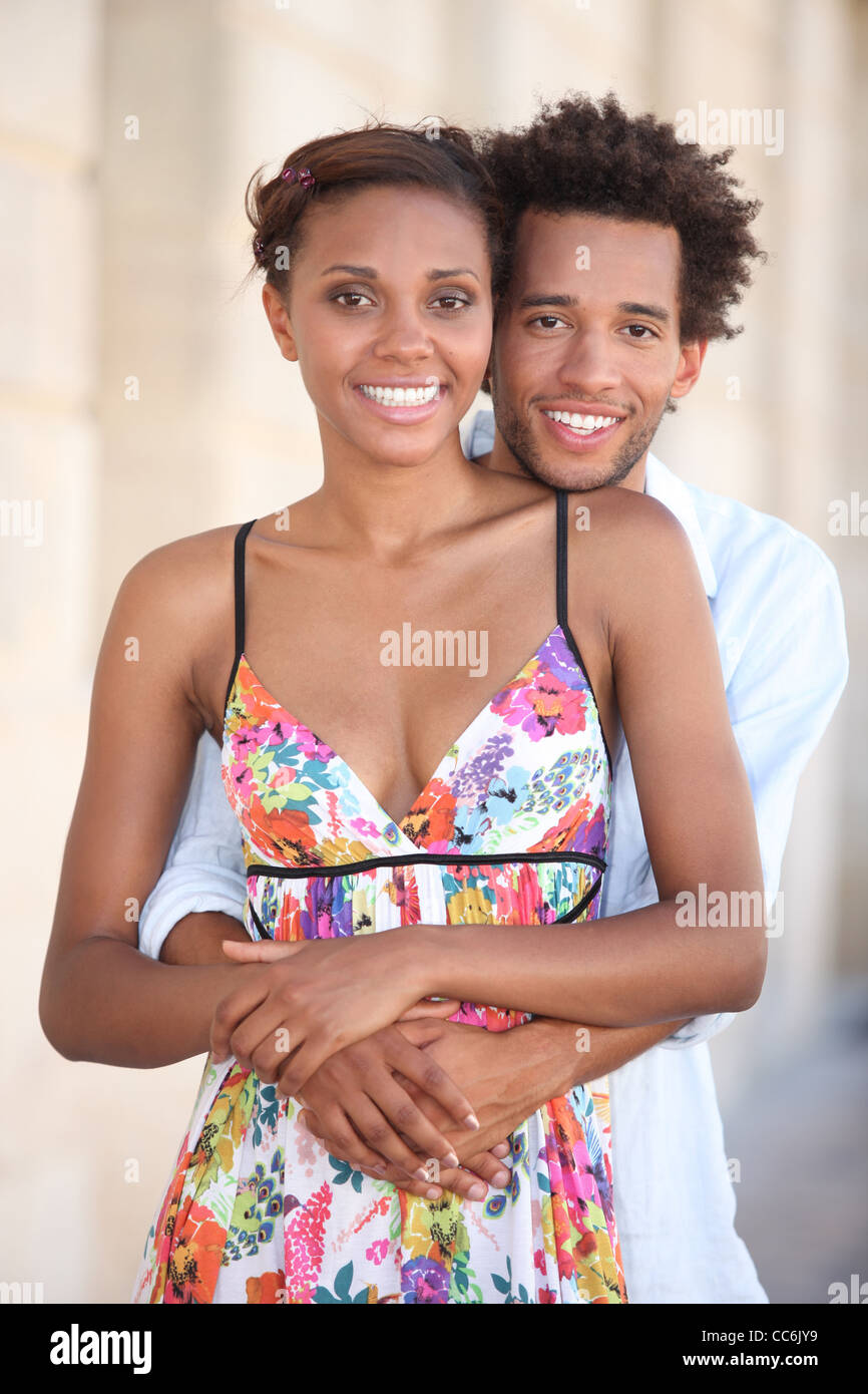 Passionate young african couple hugging hi-res stock photography and ...