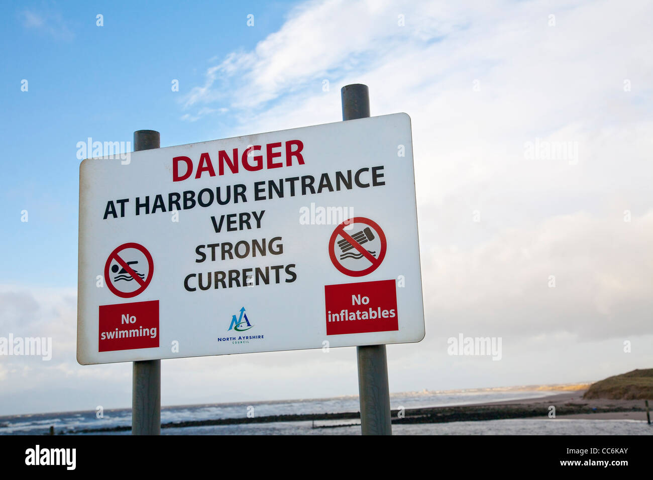 Danger sign warning of strong currents Stock Photo