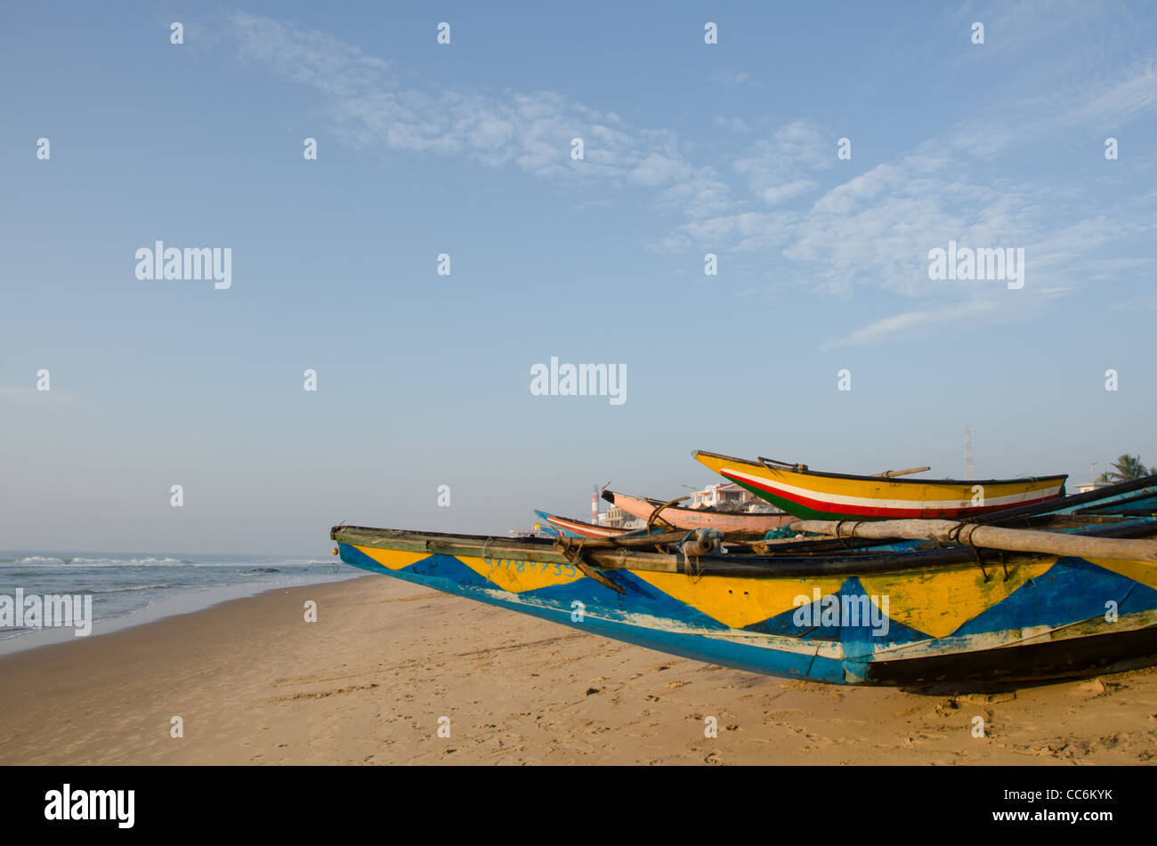 India, Odisha state, Puri, small boy on local colorful fishing boats -  SuperStock