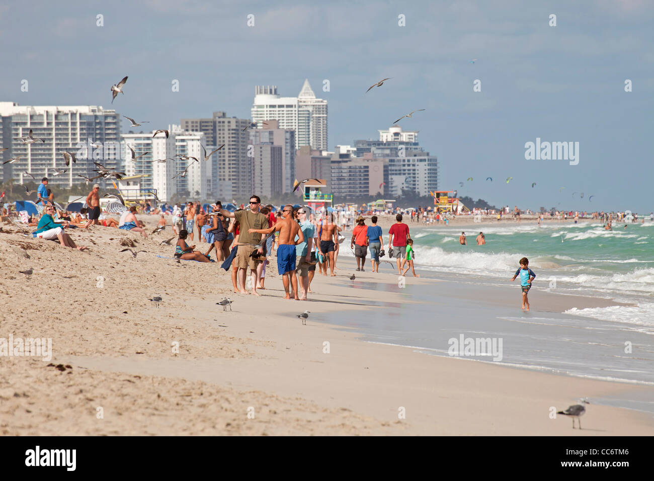 tourist at the beach with the South Beach Skyline, Miami, Florida, USA Stock Photo