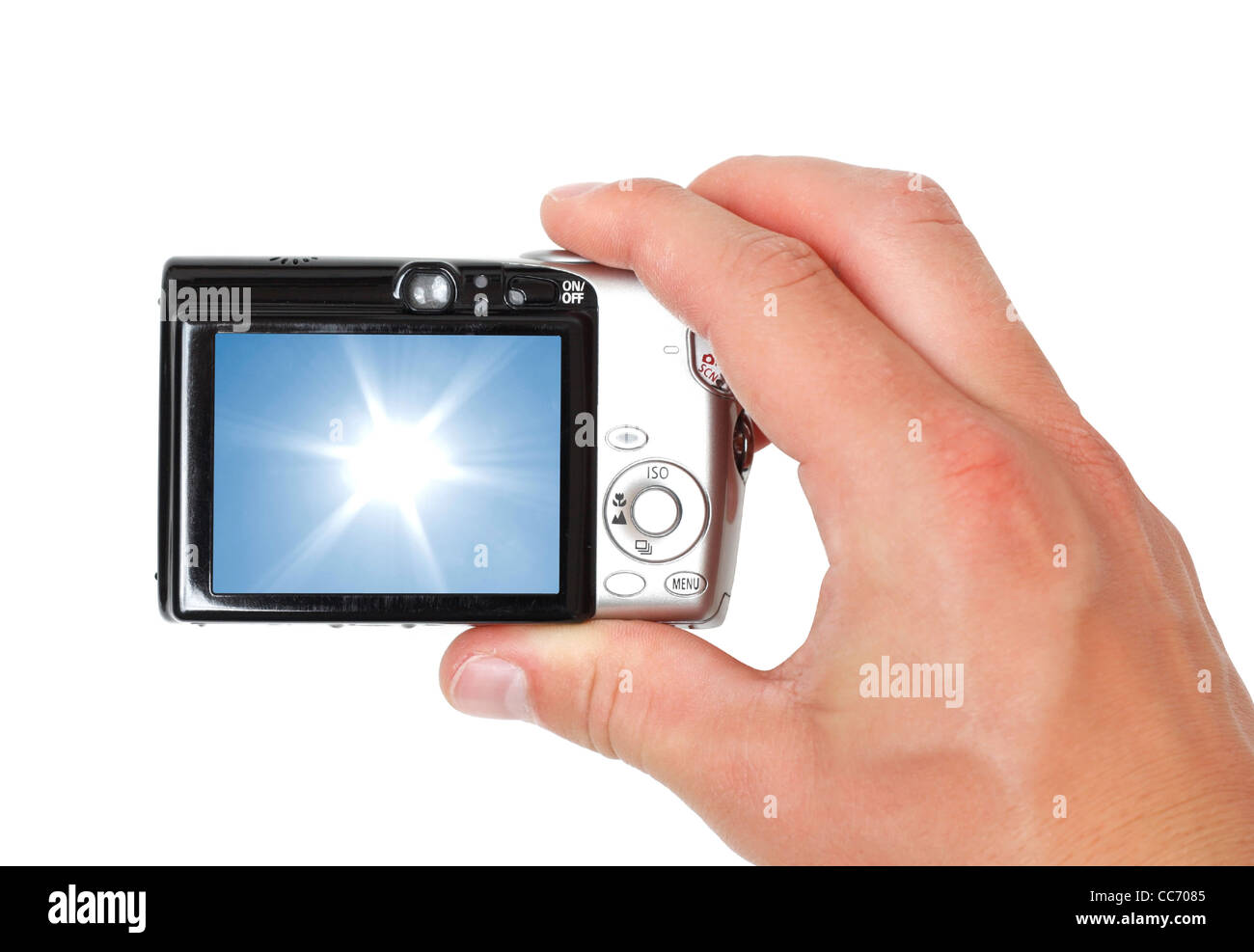 A hand taking digital pictures Stock Photo