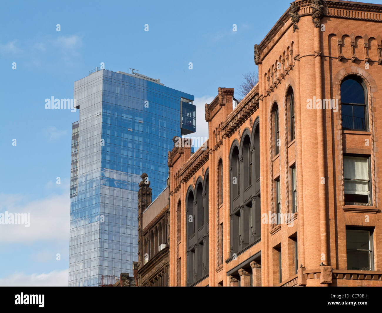 Architecture, SoHo Cast Iron Historic District with Dominick Hotel in Background, NYC Stock Photo