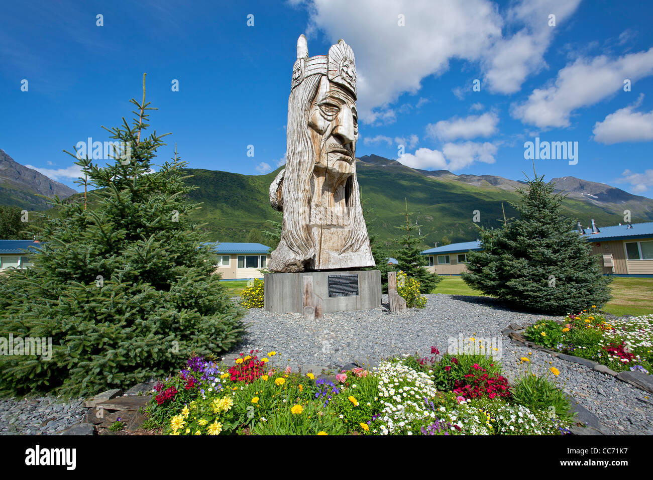 Wood sculpture. Valdez. Alaska. USA Title: Trail of the Whispering Giants. Artist: Peter 'Wolf' Toth Year: 1981 Stock Photo