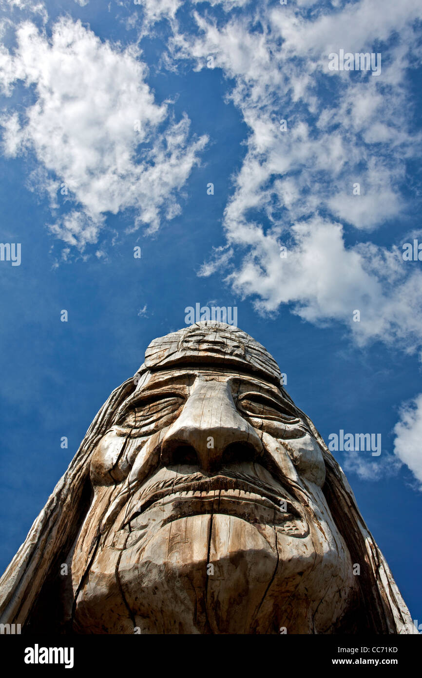 Wood sculpture. Valdez. Alaska. USA Title: Trail of the Whispering Giants. Artist: Peter 'Wolf' Toth Year: 1981 Stock Photo