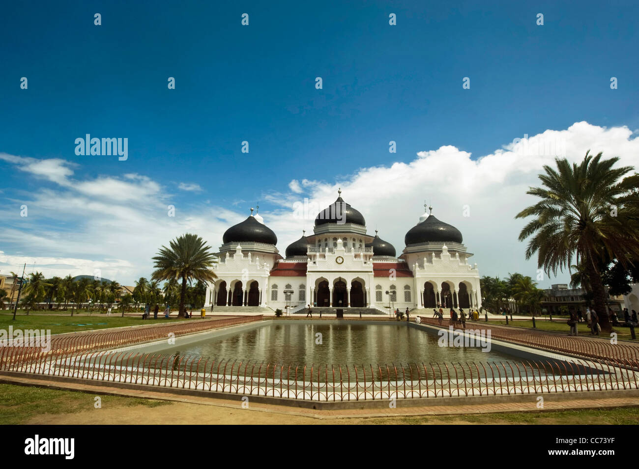 Indonesia, Sumatra, Banda Aceh, Baiturrahman Grand Mosque (Mesjid Raya Baiturrahman) against blue sky Stock Photo