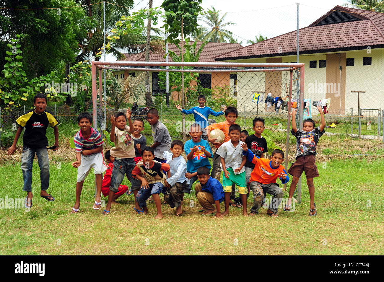 Indonesia, Sumatra, Banda Aceh, group of happy children jumping Stock Photo