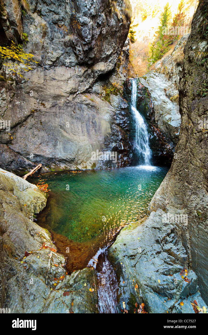 Landscape with waterfall in the mountains Stock Photo - Alamy