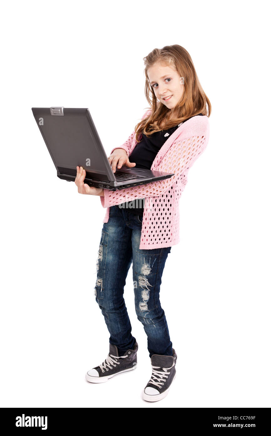 Cute girl holding a laptop isolated on white background Stock Photo - Alamy