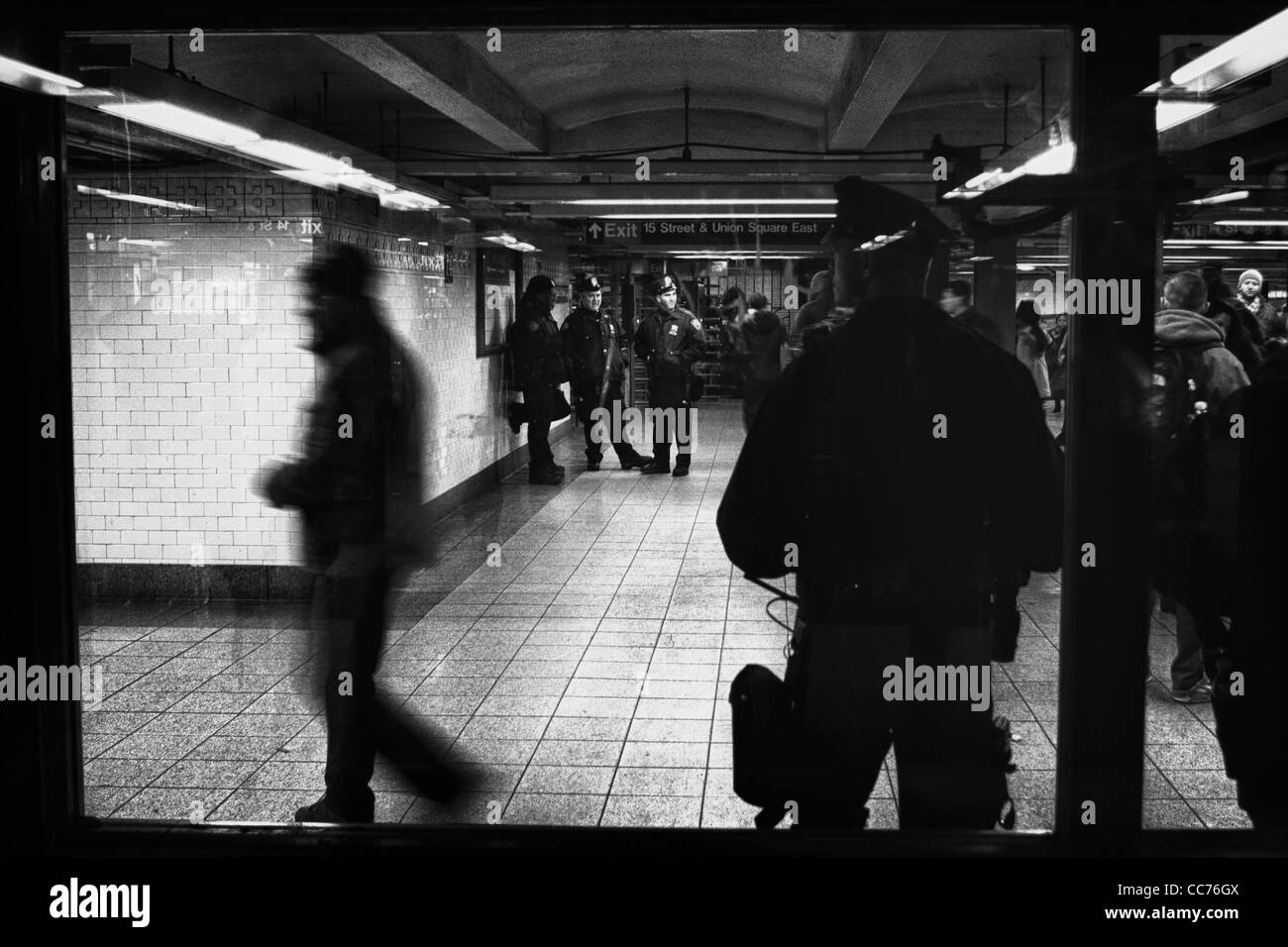 Policeman in subway Stock Photo
