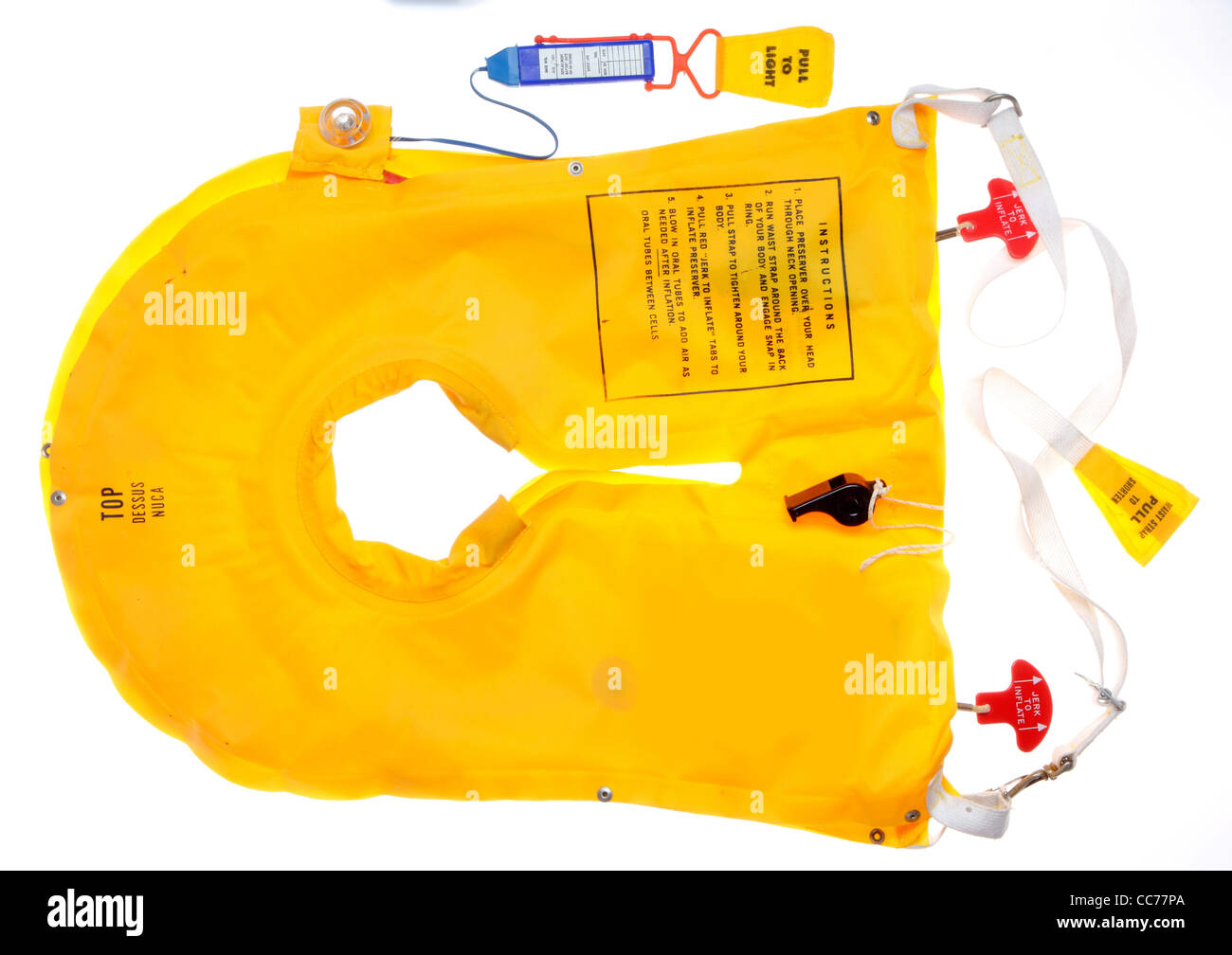 Yellow life vest, for use in airplanes, as emergency equipment. Inflatable. Stock Photo