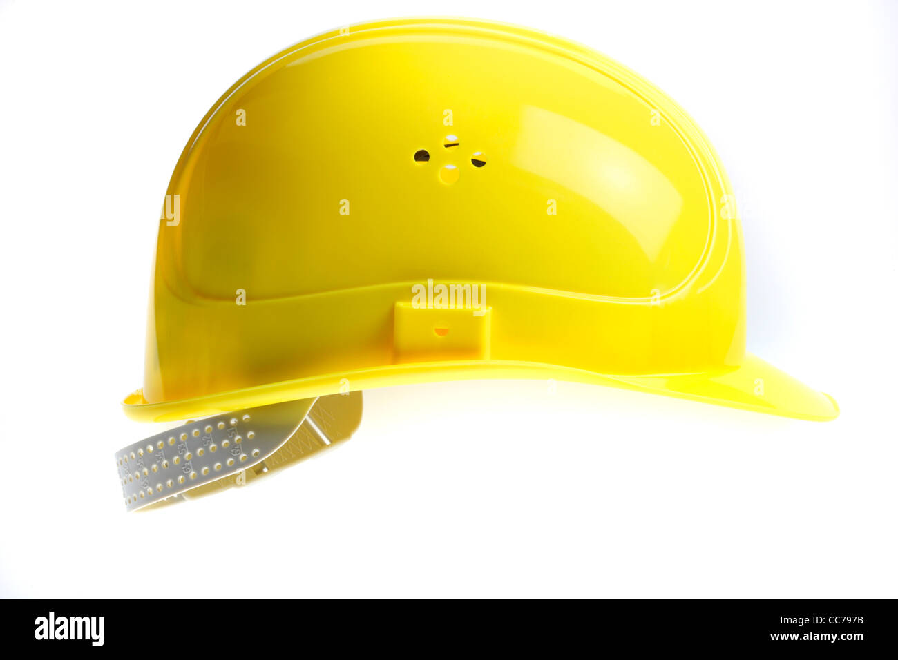 Yellow hard hat, personal protective equipment. Stock Photo