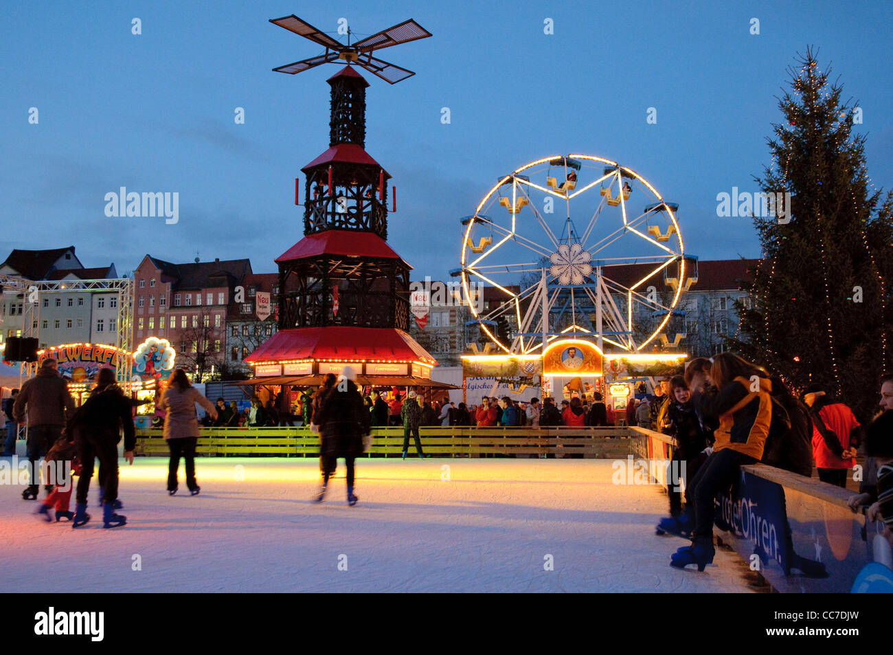 Ice rink at the Christmas market in the evening, Jena, Thuringia, Germany, Europe Stock Photo