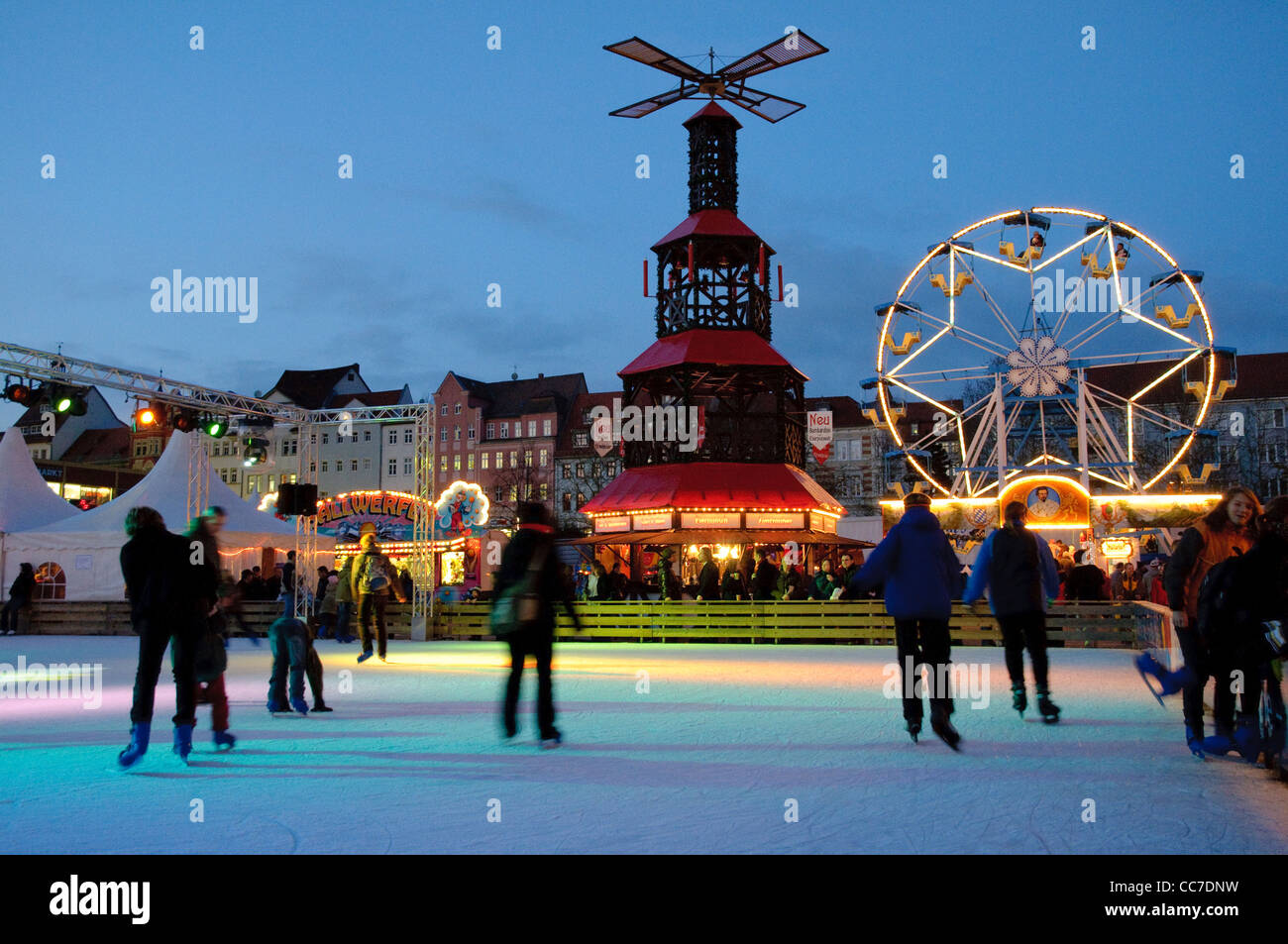 Ice rink at the Christmas market in the evening, Jena, Thuringia, Germany, Europe Stock Photo