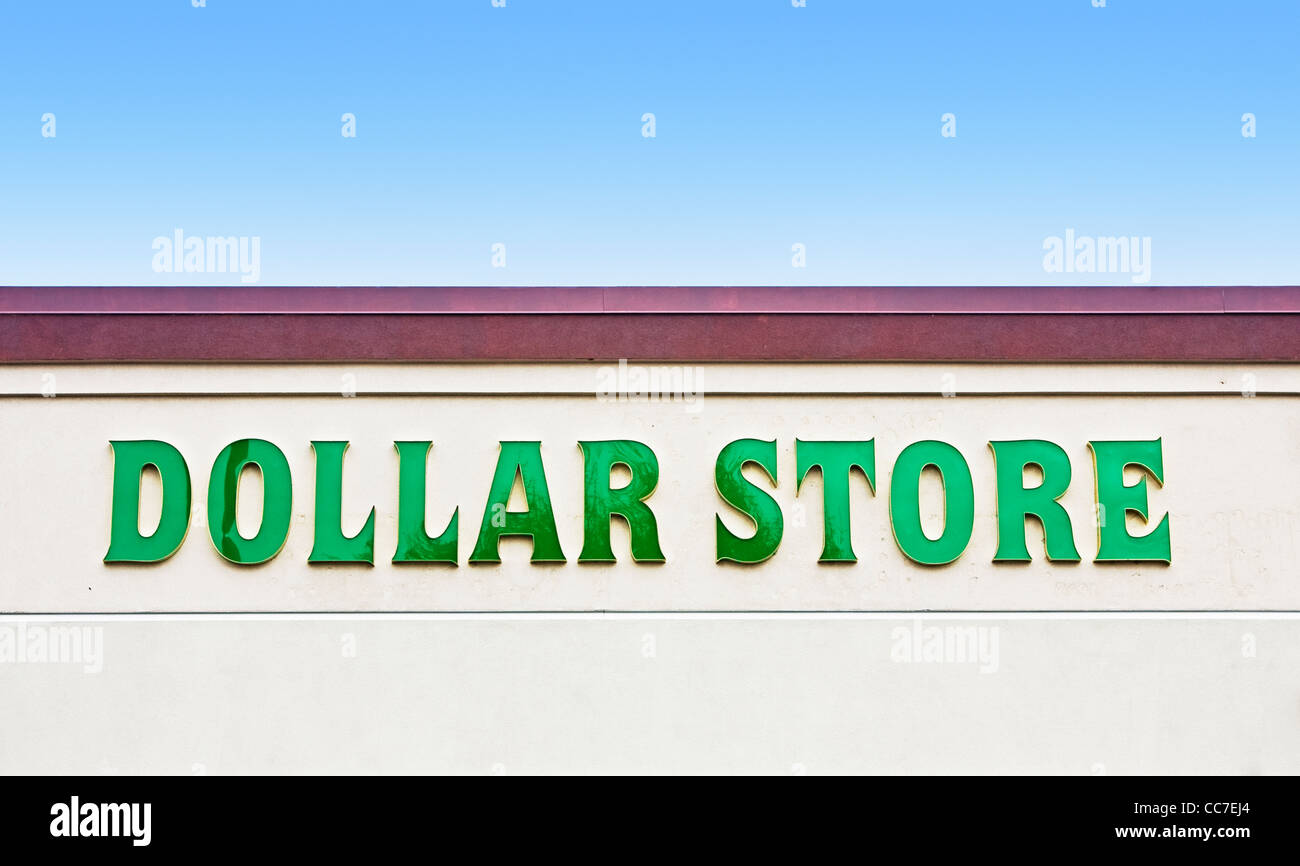 dollar store sign on wall of building Stock Photo - Alamy