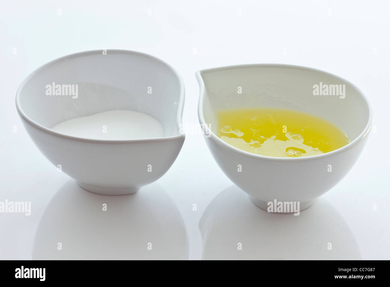 Bowls with sugar and egg whites Stock Photo Alamy