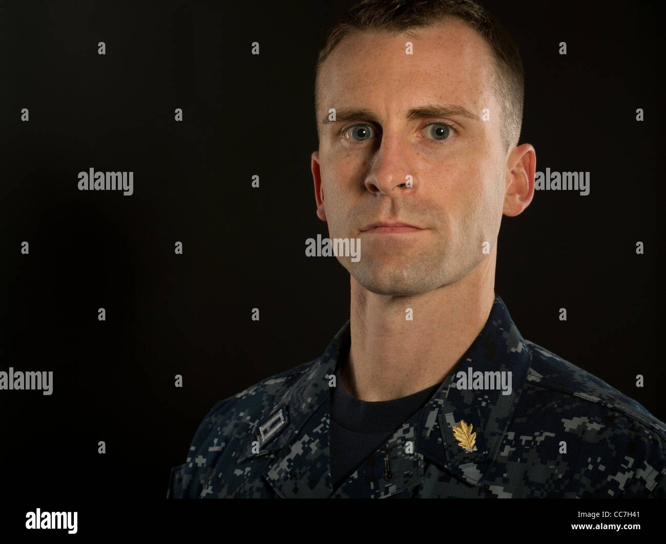 United States Navy Officer in Navy Working Uniform Stock Photo