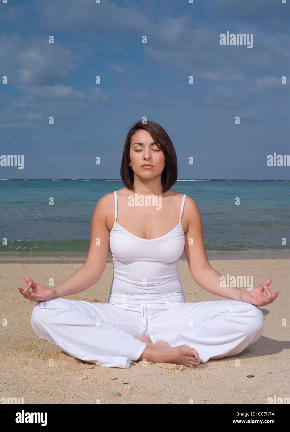 Yoga posture Ardha Padmasana Half Lotus pose Stock Photo Alamy