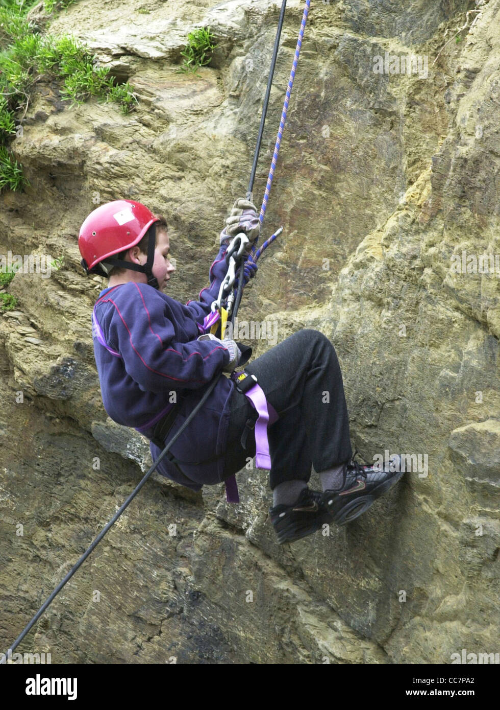 Child children abseiling rock climbing Stock Photo Alamy