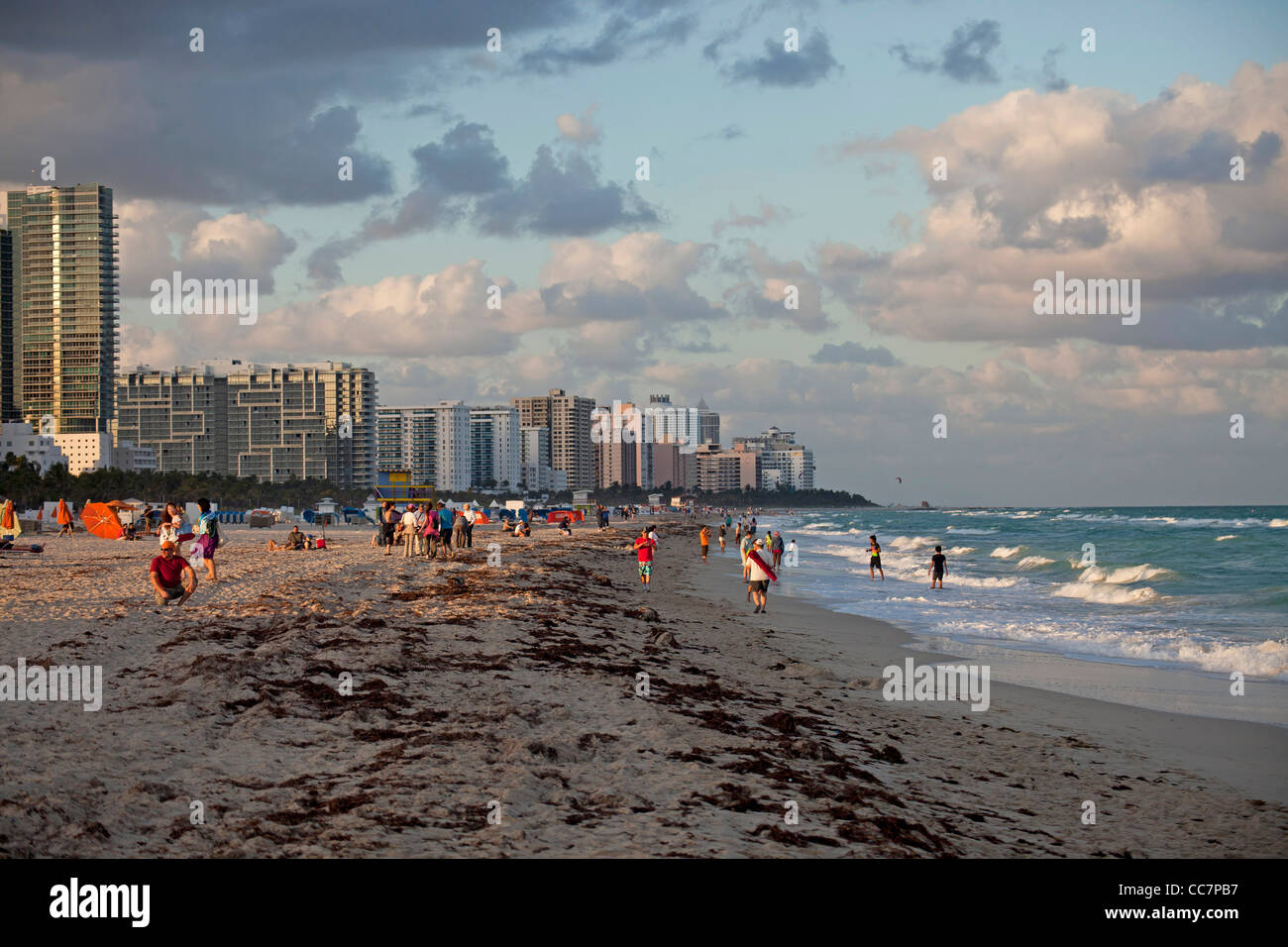 tourists at the beach with the South Beach Skyline, Miami, Florida, USA Stock Photo