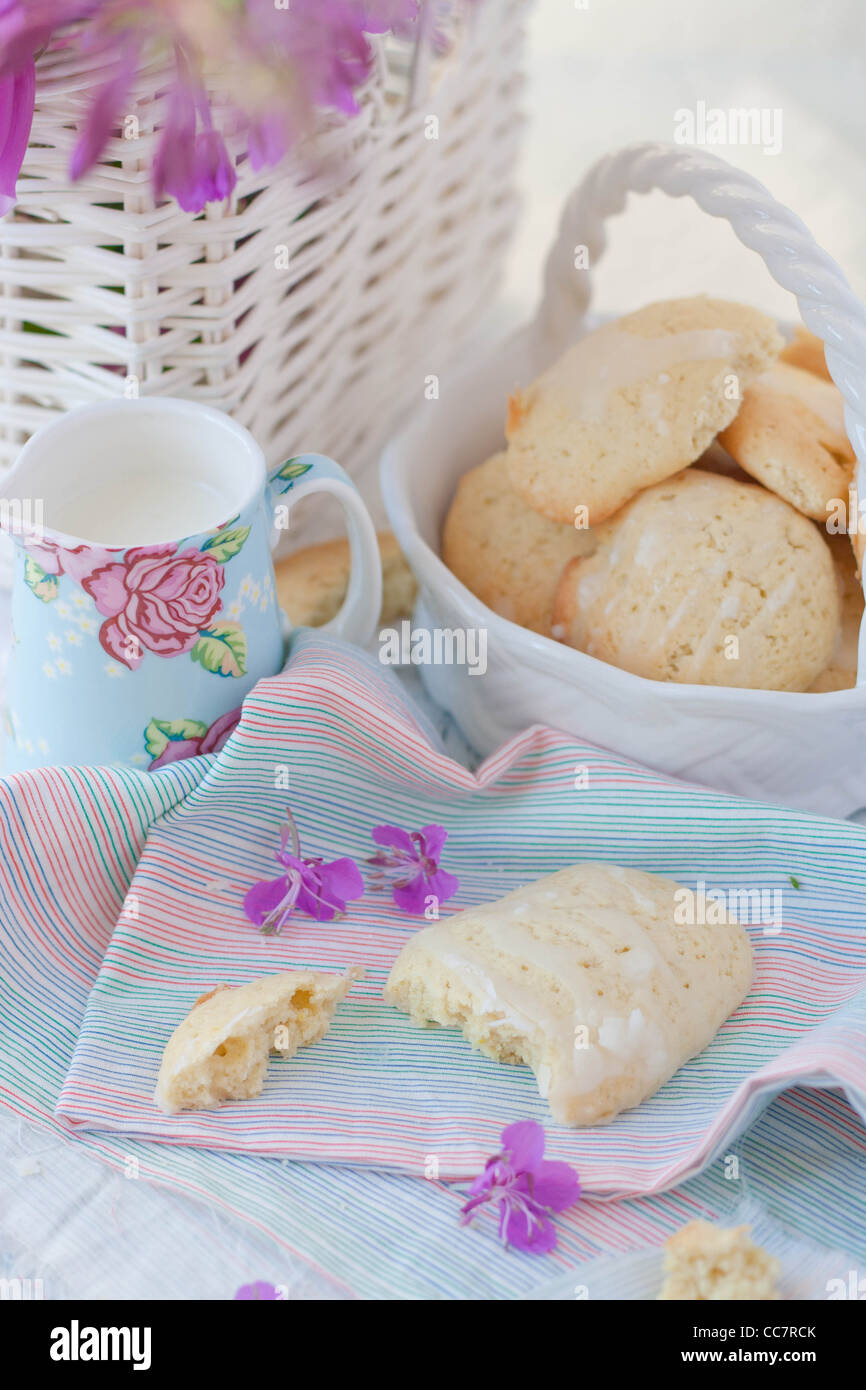 Lemon cookies and a jug of milk Stock Photo