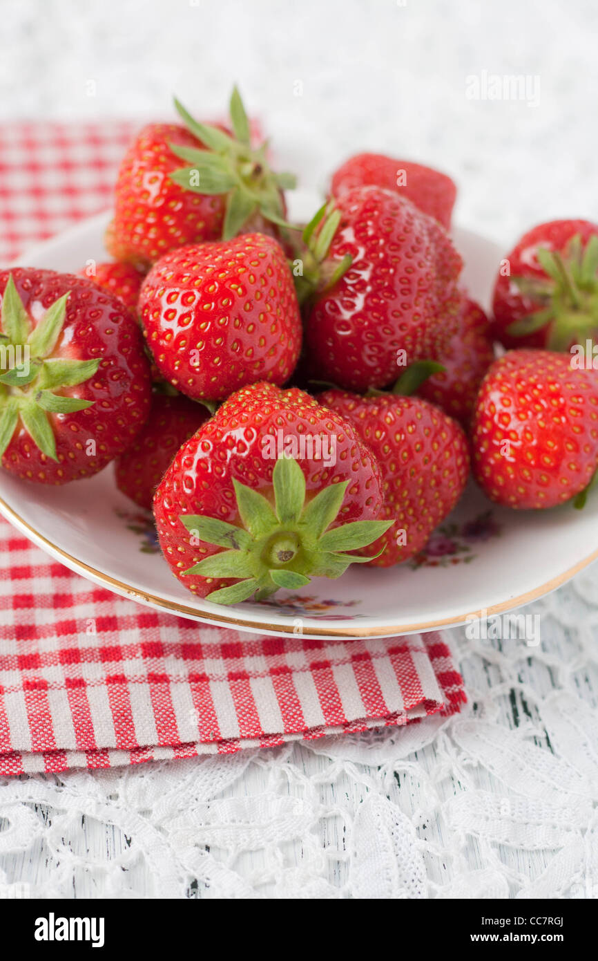 Strawberries on a plate with a red checked napkin Stock Photo