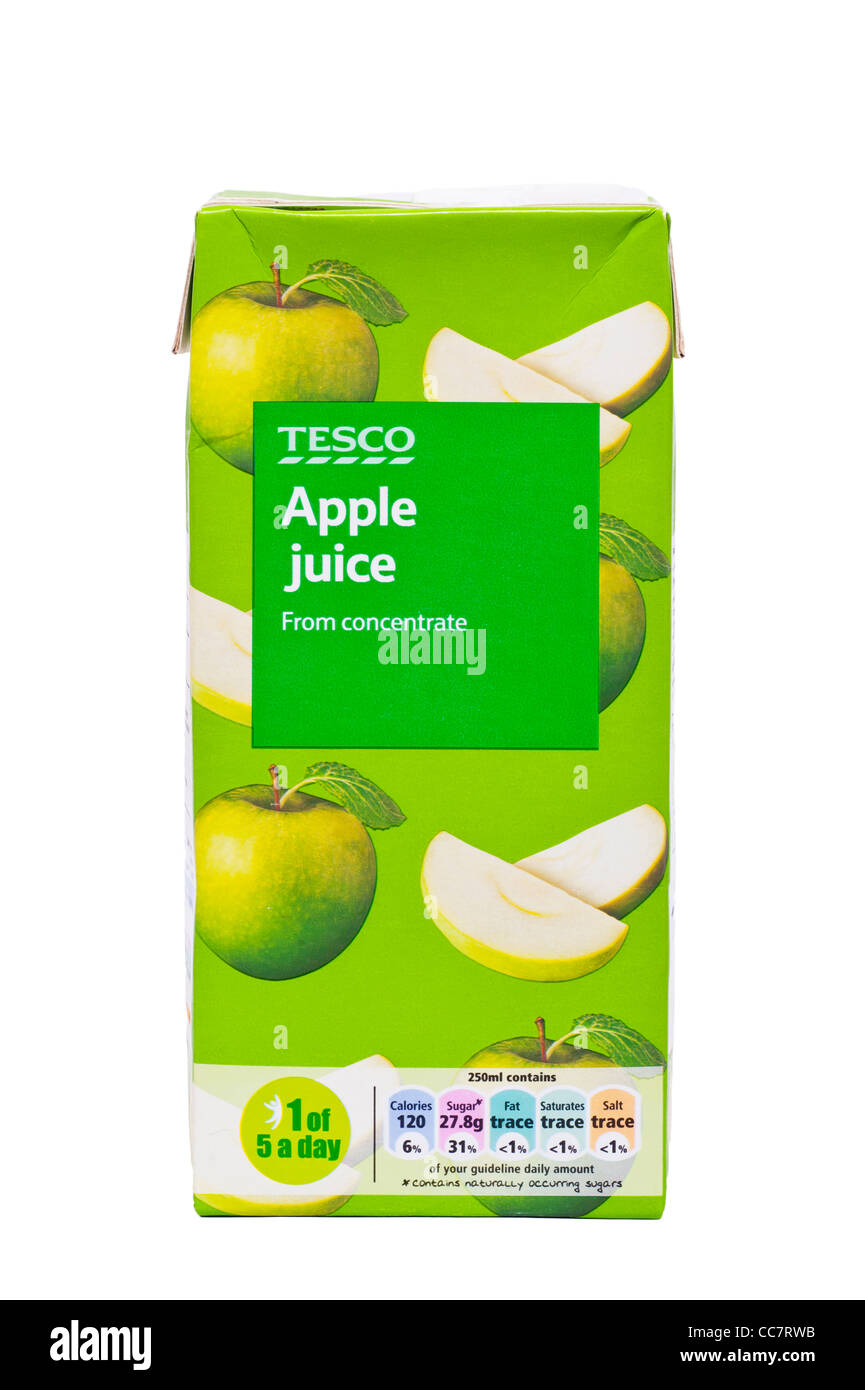 A carton of Tesco brand apple juice from concentrate on a white background Stock Photo