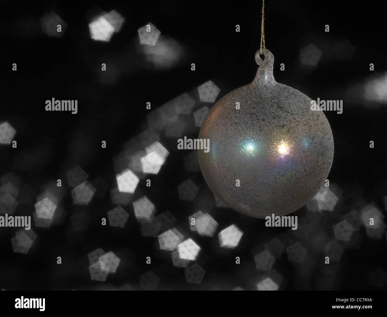 Christmas bauble in dark blurry back Stock Photo
