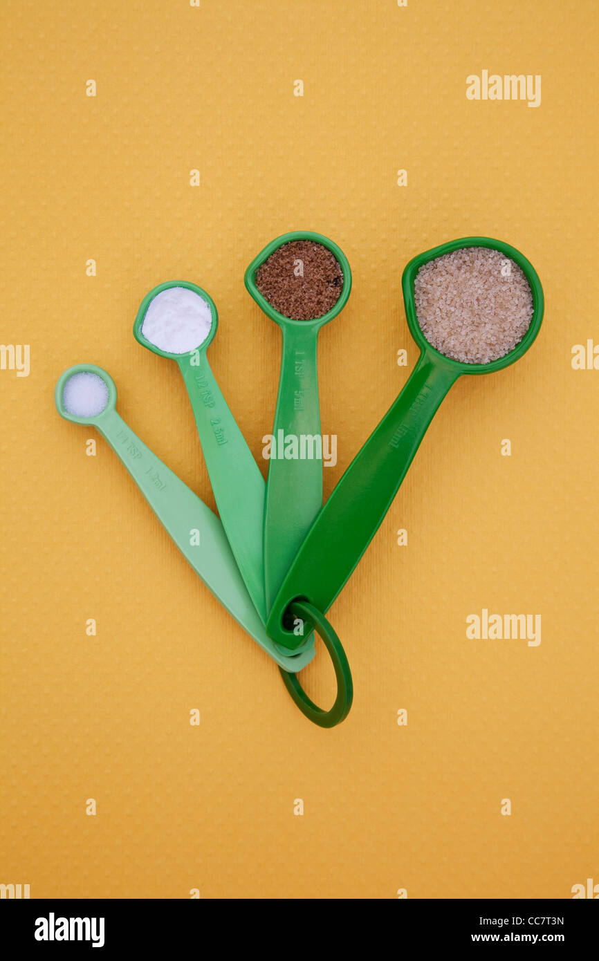 Measuring spoons full of spices Stock Photo Alamy