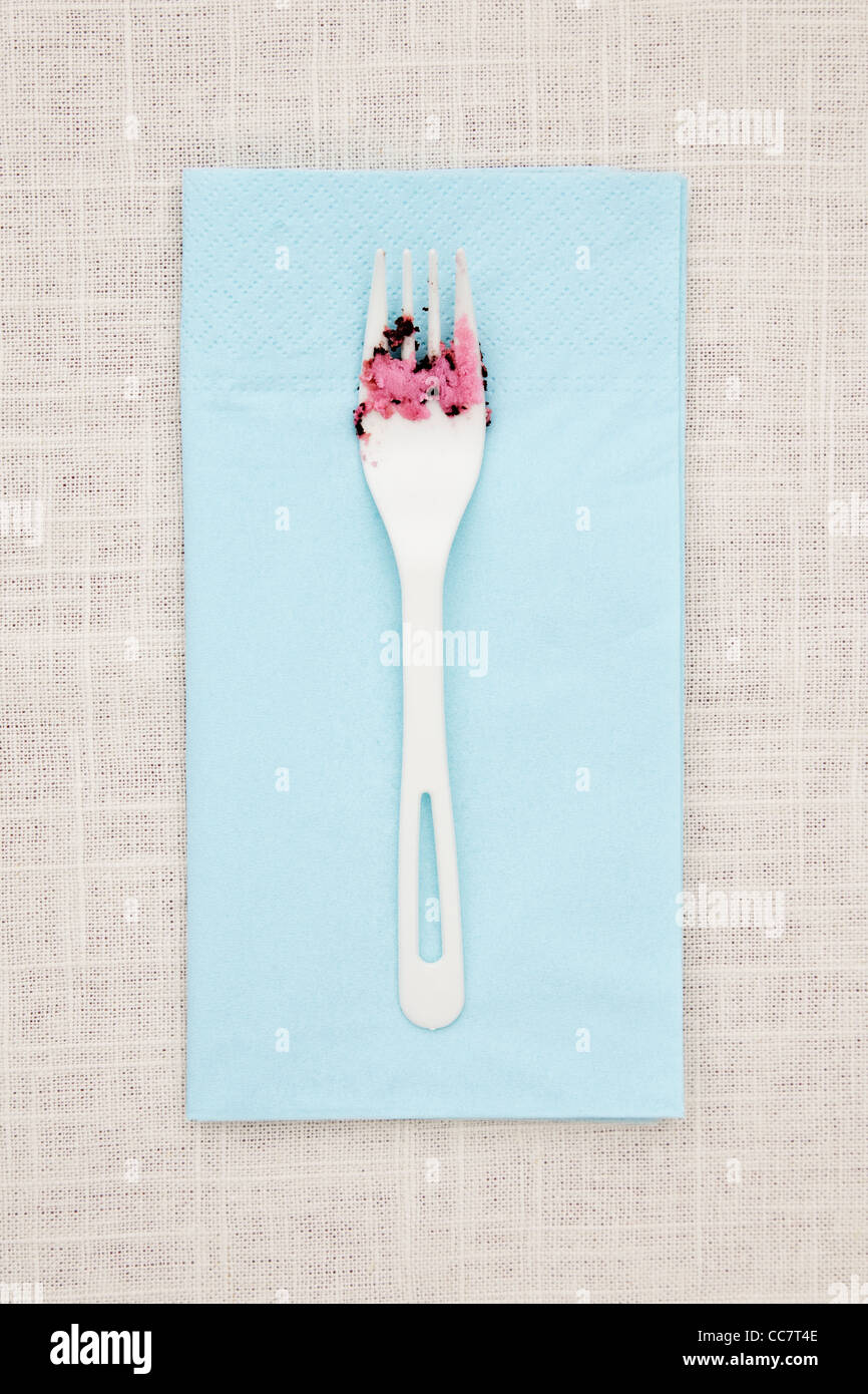 Fork on napkin with icing Stock Photo